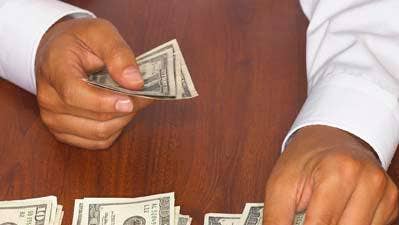 Hands counting cash